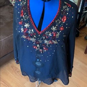 Beautiful sheer over blouse . Embellished